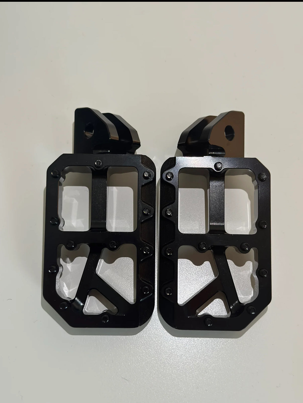 Black pegs